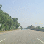 Mirage effect on highway during hot summer
