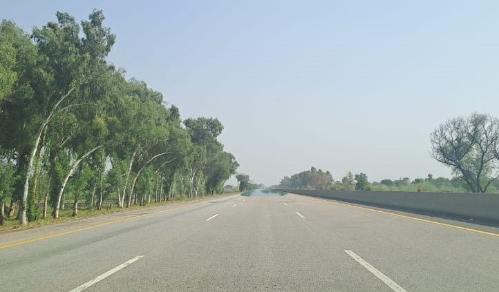 Mirage effect on highway during hot summer