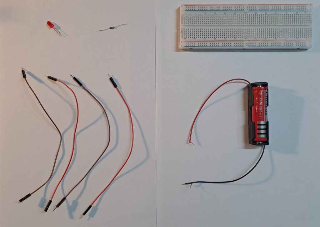 List of components showing LED, Resistor, Breadboard, Jumper wires and Cell.