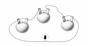 Black-and-white feature image of a simple fruit-powered circuit showing three oranges connected with wires and metal electrodes, powering a small LED light at the bottom. The clean diagram illustrates how fruits can act like batteries in a basic science experiment.